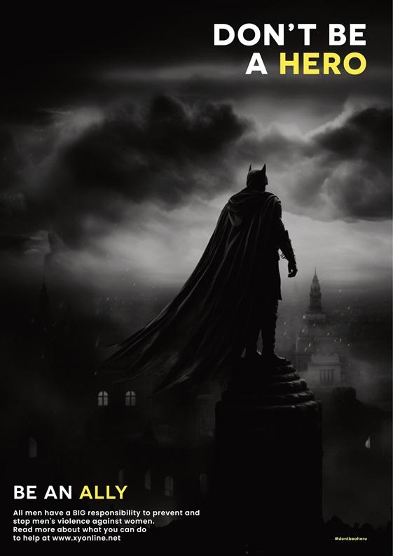 Czarno biała grafika przedstawiająca sylwetkę batmana, patrzącego na panoramę zniszczonego miasta. Na grafice widnieje napis: Nie bądź bohaterem, bądź sojusznikiem. 